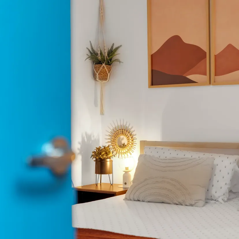 View through the atmospheric bedroom of Apartamento Picasso